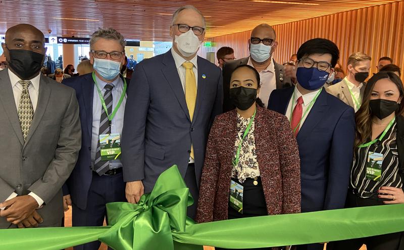 Lance Lyttle Commissioner Felleman Governor Jay Inslee Commissioners Mohamed Cho and Hasegawa pose at the reveal celebration of the new International Arrivals Facility at SEA airport.
