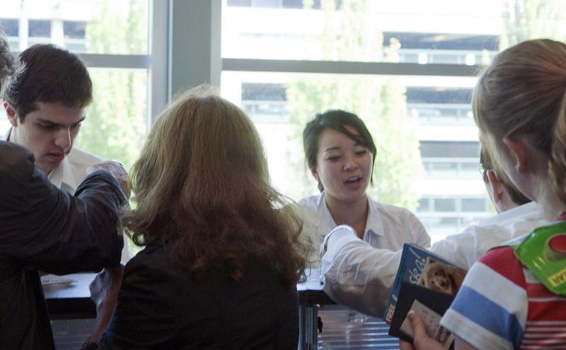 Customer service agents assist cruise passengers at Bell Harbor Cruise Terminal in Seattle