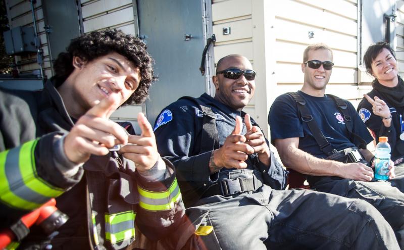 Firefighters pointing at you.