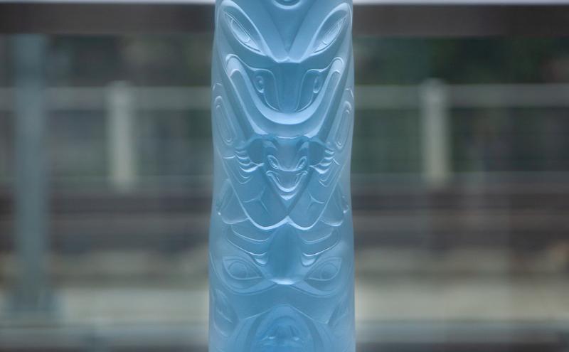 Lead Crystal that looks like a totem with the Killer Whale with an Eagle on the top representing my family symbols. Emerging from the mouth of the Killer Whale is a Thunderbird, which was the clan that Svenson was adopted into. The bottom form is a double headed wolf, as a kind of soul catcher and morphing  into a three-dimensional wolf at the center.  