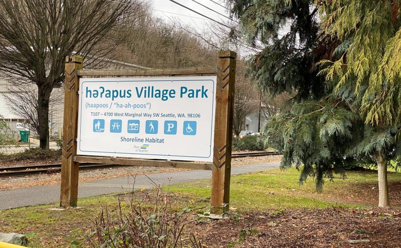 Sign in həʔapus Village Park & Shoreline Habitat that reflects updated name and pronunciation. 
