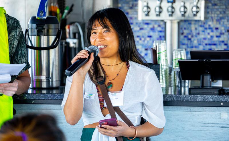 PCAT member speaking at the Multilingual Boat Tour.