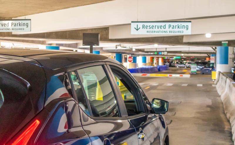 A car entering Reserved Parking in the SEA airport garage.