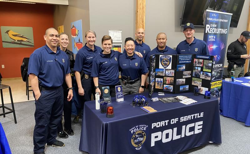 Port Police recruiting team tabling at an event.
