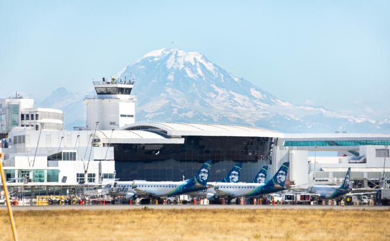 SEA Airport's airfield of the terminal with Mount Rainier in the background.