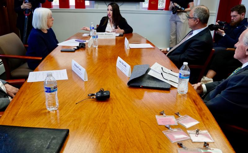 Commissioner Hasegawa at a filmed roundtable discussion.