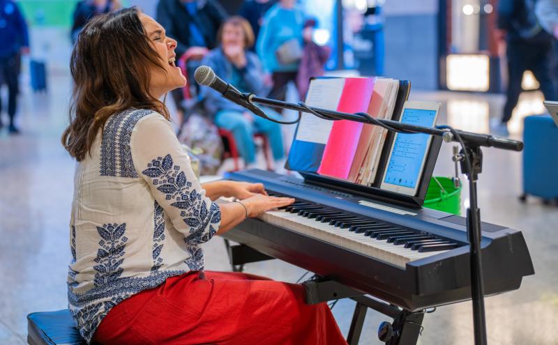 Kristin Chambers passionately playing the piano at Sub Pop.
