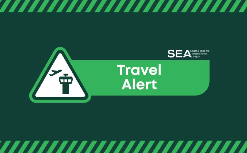 SEA Airport logo and the words Travel Alert