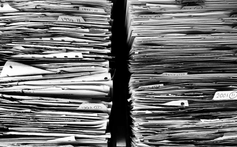 Stack of paper documents. 