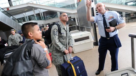 Military member at SEA airport.