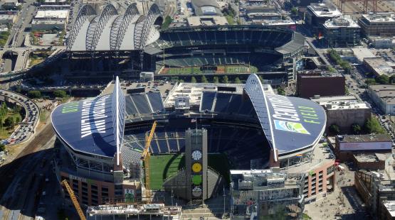 Aerial view of CenturyLink train tracks buildings roads and Safeco Field in Seattle in June 25 2016. Home of the Seattle Seahawks (NFL) Mariners (MLB) and Sounders (MLS). Stock Photo ID: 202233658 Copyright: EricBVD
