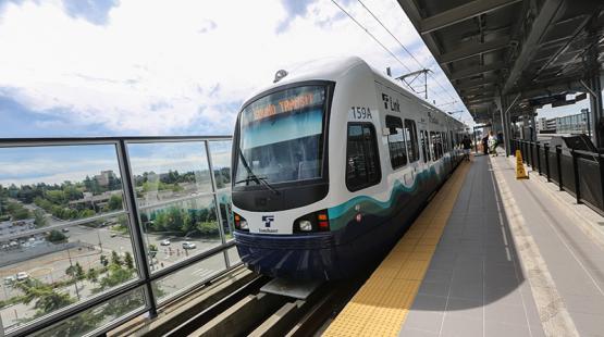 Mass transit train pulls into Seattle-Tacoma Airport Station.
