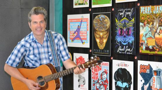 Mark Pickerel with Pearl Jam Exhibit at Sea-Tac Airport