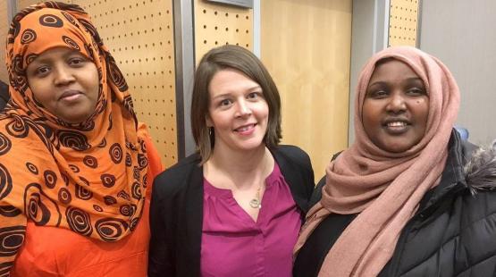 Commissioner Gregoire with two Somali Women.