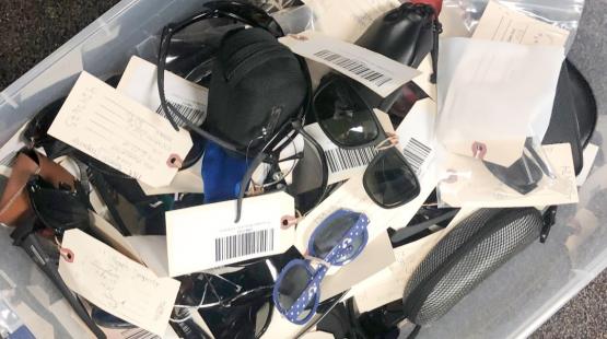 Pile of sunglasses at Lost and Found.