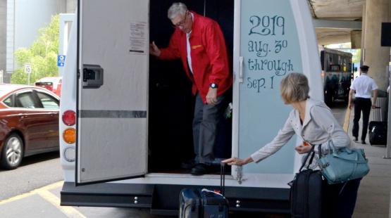 Whidbey shuttling picks up passengers at the airport.