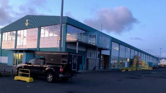 Port of Reykjavik Ice House Coworking Space building exterior at dusk.