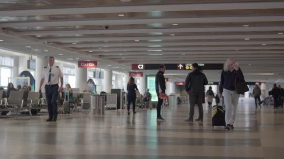 Terminal at SEA Airport with very few travelers during the COVID pandemic