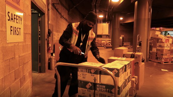 Kurt Mitchell unboxing boxes at the Load Dock