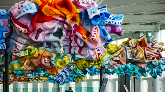 Art installation featuring bright colored fabric.
