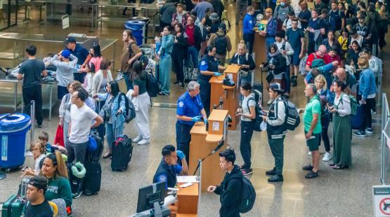 People traveling through TSA security checkpoints, SEA Airport