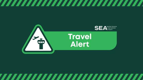 SEA Airport logo and the words Travel Alert
