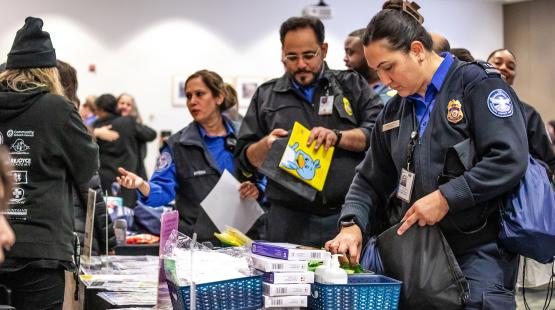 Federal workers visit a resource fair at SEA Airport.