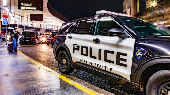 Port of Seattle Police Department vehicle parked on the Departures drive at Seattle-Tacoma International Airport