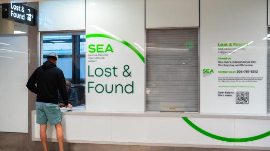 Customer getting help at Lost and Found