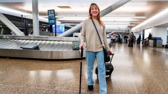 Traveler with a can walking through baggage claim