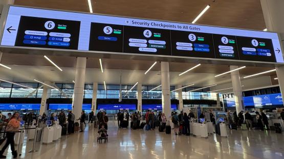 The new signage over gates at SEA airport with wait times displayed